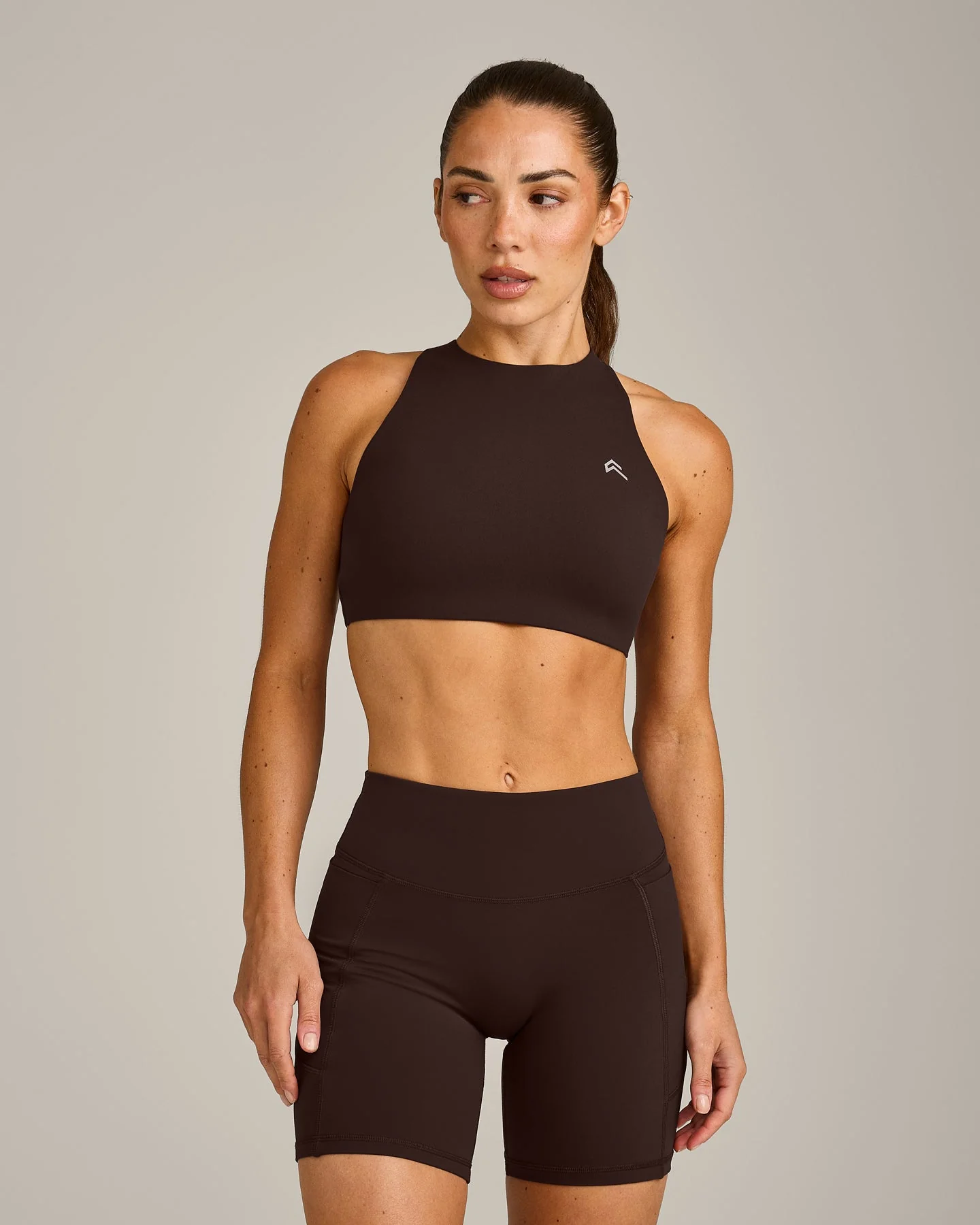 EasyLift™ High Neck Sports Bra with Grey Logo | 70% Cocoa