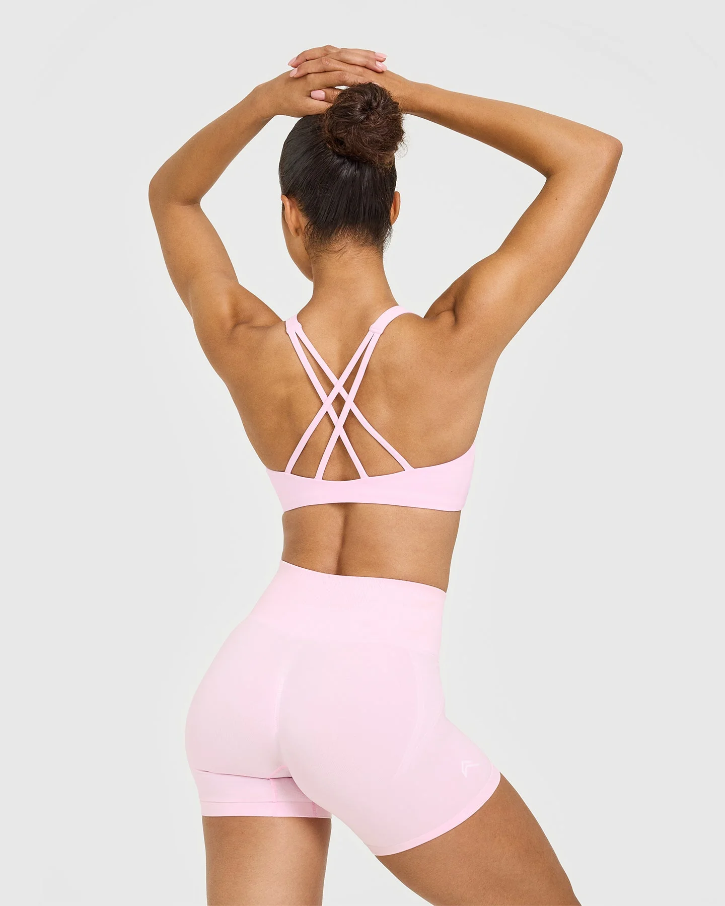 EasyLift™ High Neck Sports Bra with White Logo | Chalk Pink - Image 6