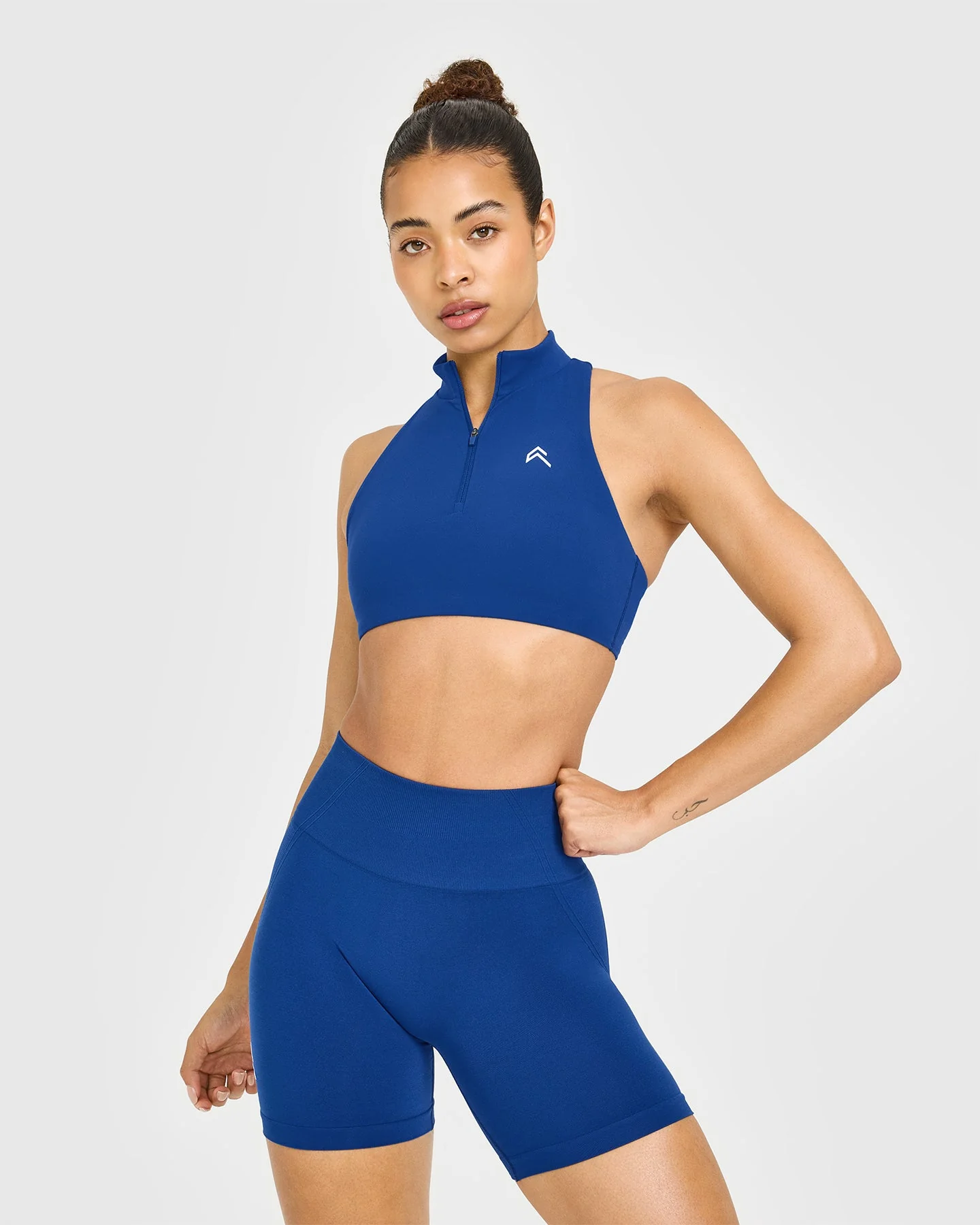 EasyLift™ Zip High Neck Sports Bra with White Logo | Vintage Navy
