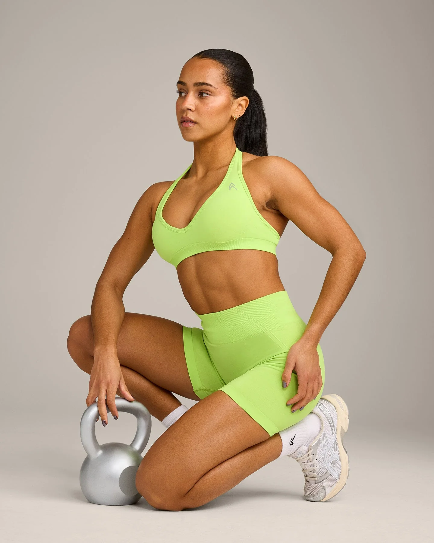 EffortlessLift™ Seamless Halter Neck Sports Bra with Grey Logo | Citrus Green - Image 6