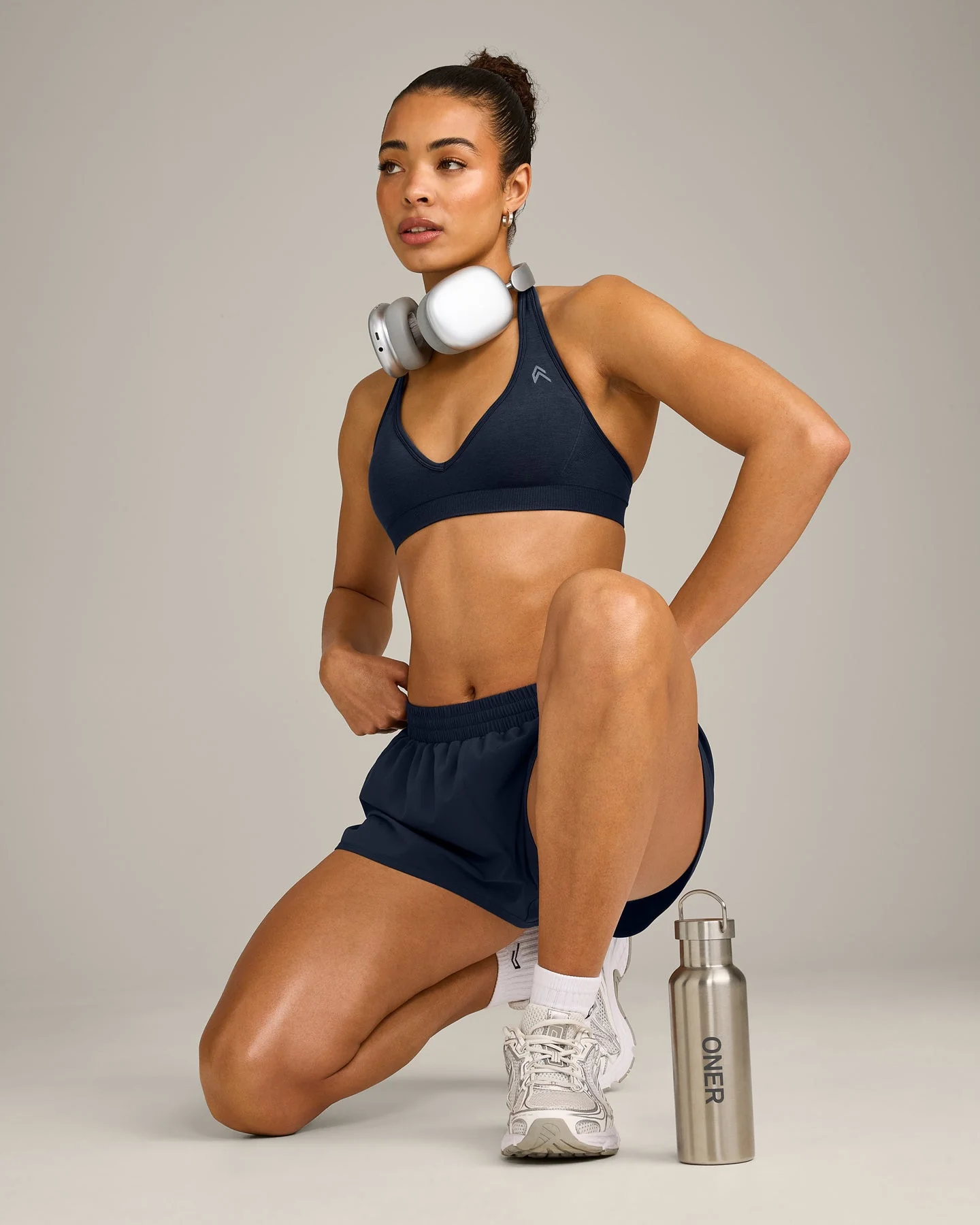 EffortlessLift™ Seamless Halter Neck Sports Bra with Grey Logo | True Blue - Image 2