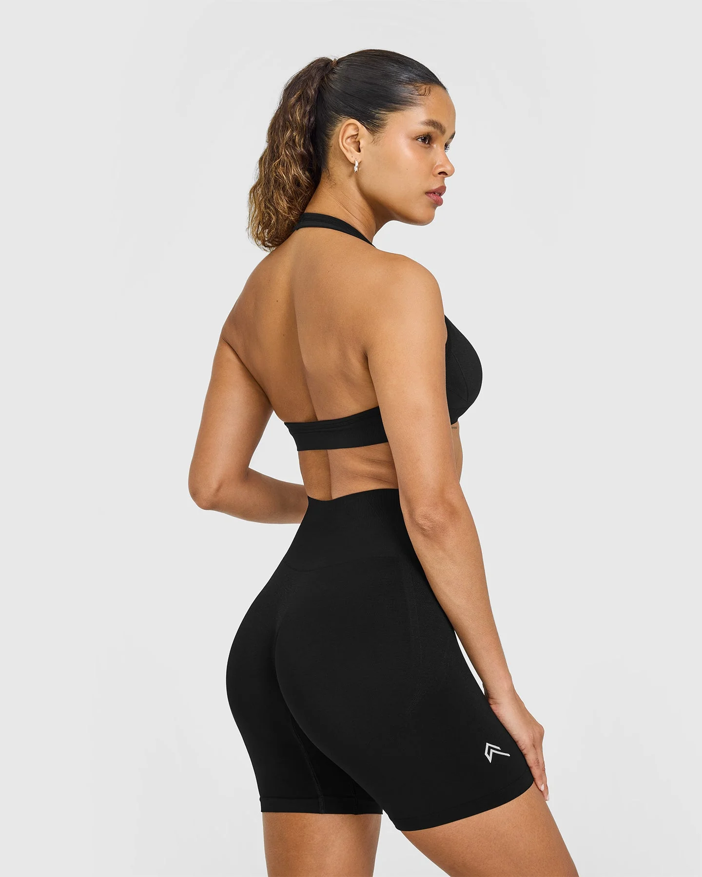 EffortlessLift™ Seamless Halter Neck Sports Bra with White Logo | Black - Image 2