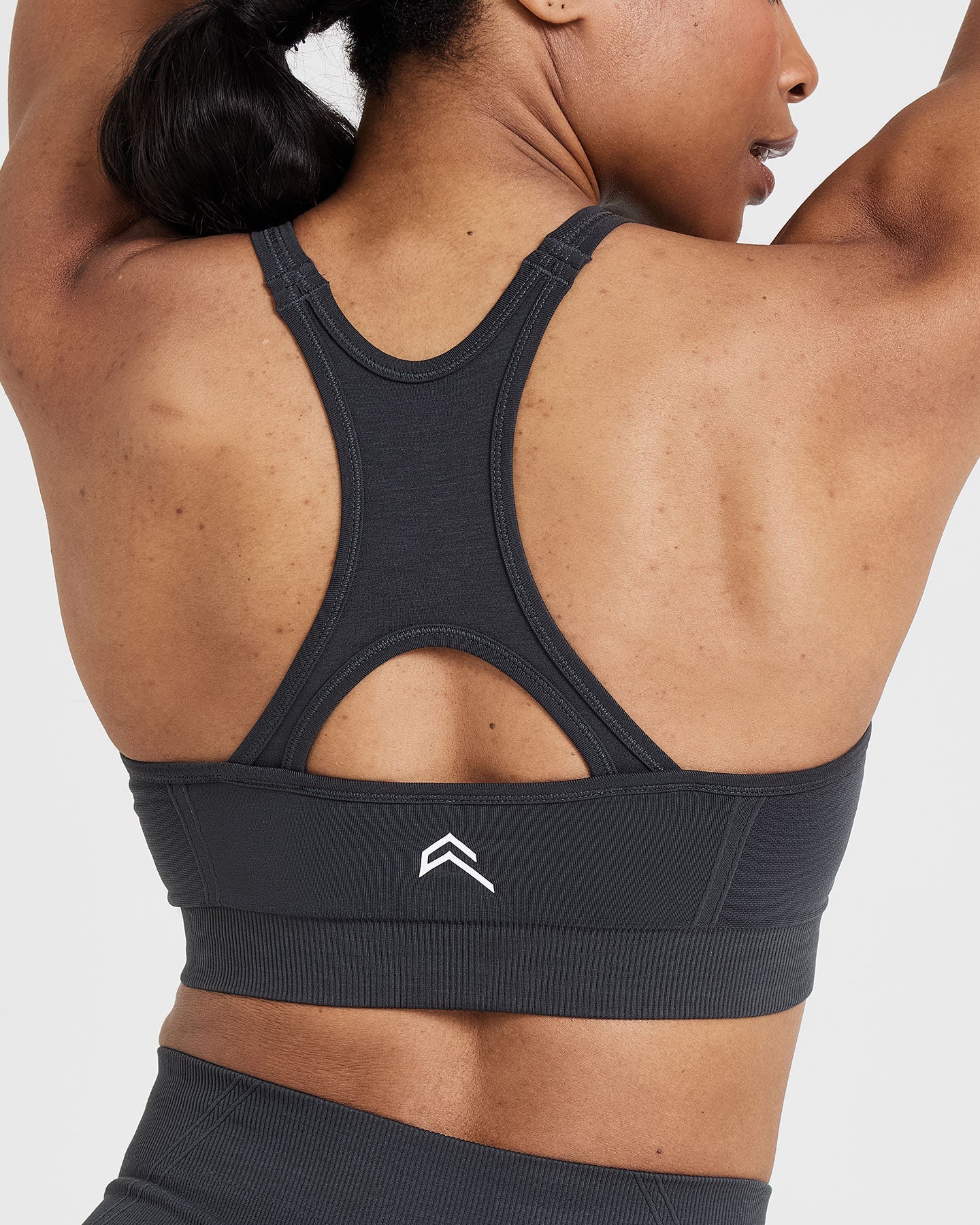 EffortlessLift™ Seamless High Neck Bralette with White Logo | Coal - Image 5