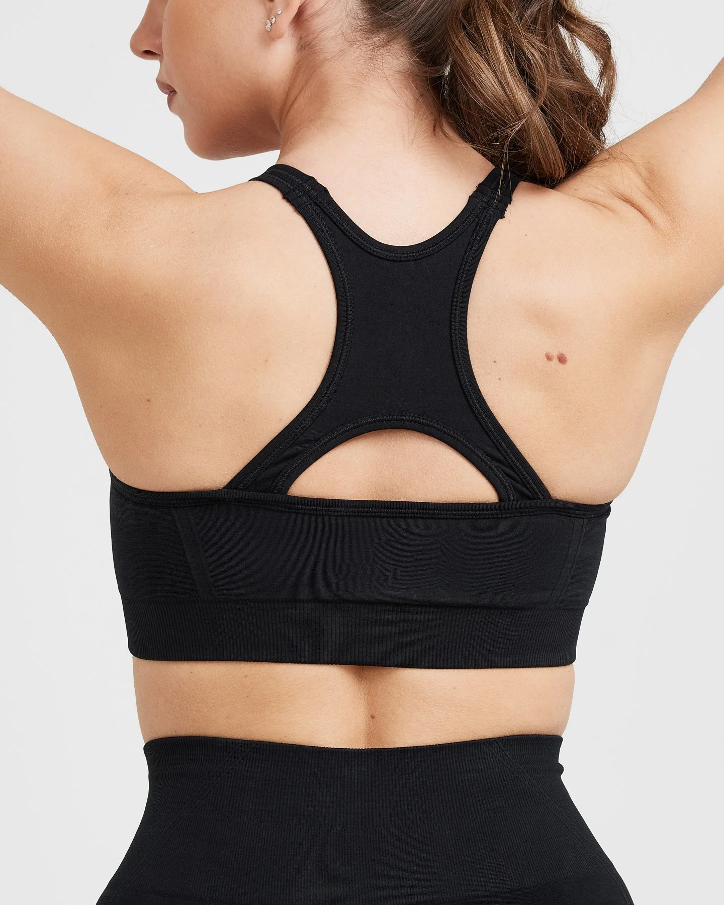 EffortlessLift™ Seamless High Neck Bralette with White Logo | Black - Image 5
