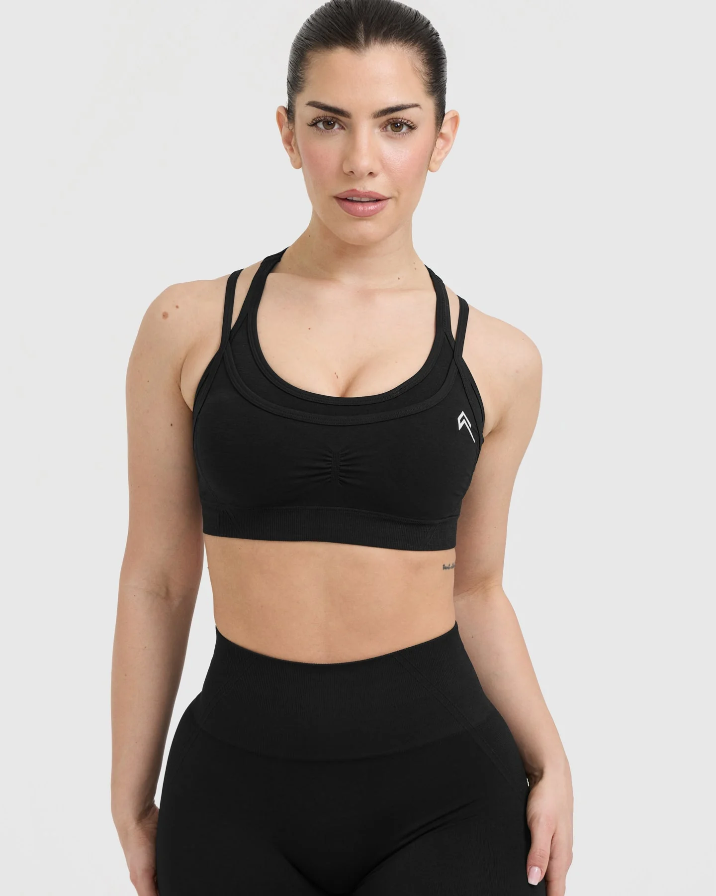 EffortlessLift™ Seamless Layered Sports Bra with White Logo | Black - Image 4