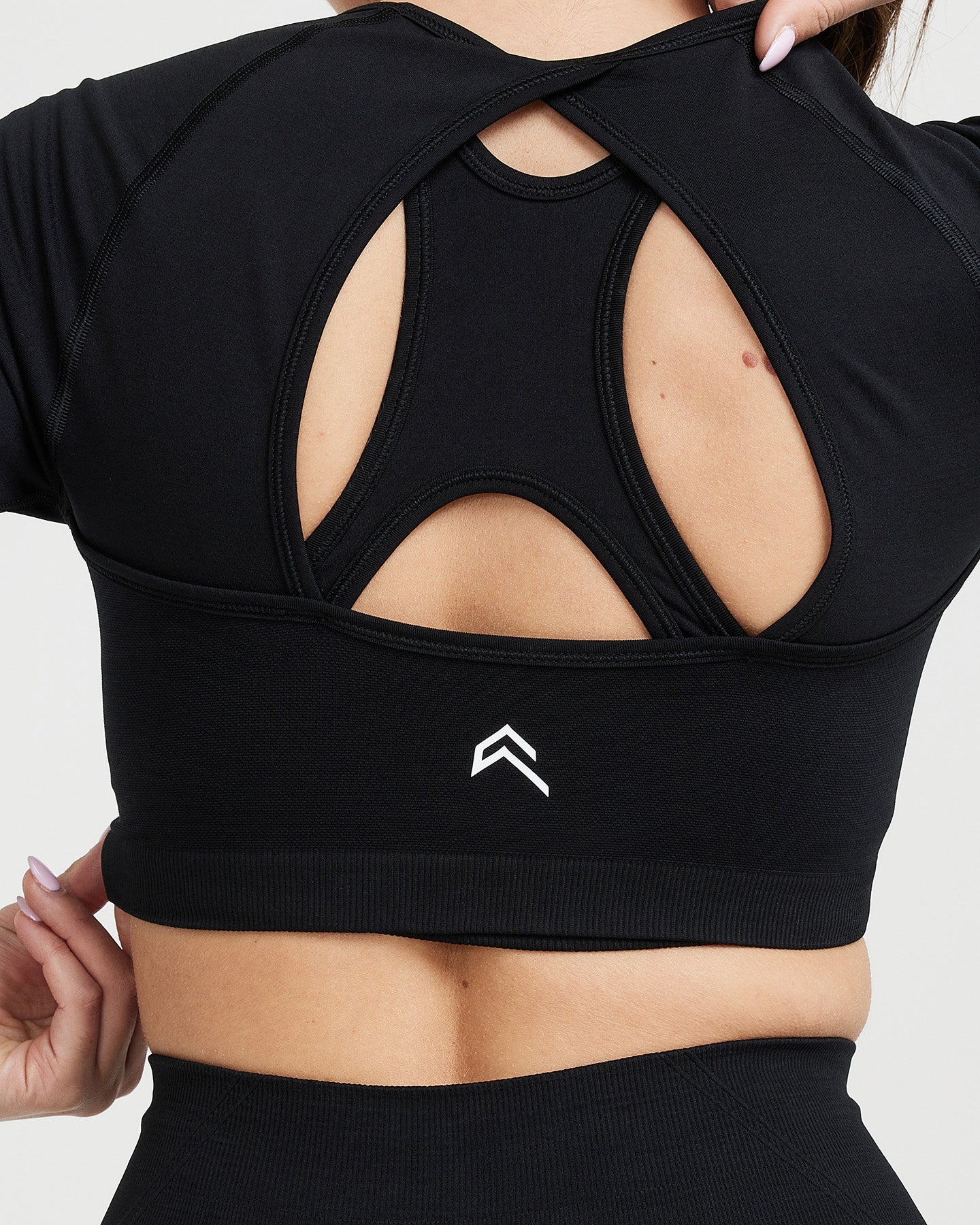 EffortlessLift™ Seamless Long Sleeve Crop Top with White Logo | Black - Image 5