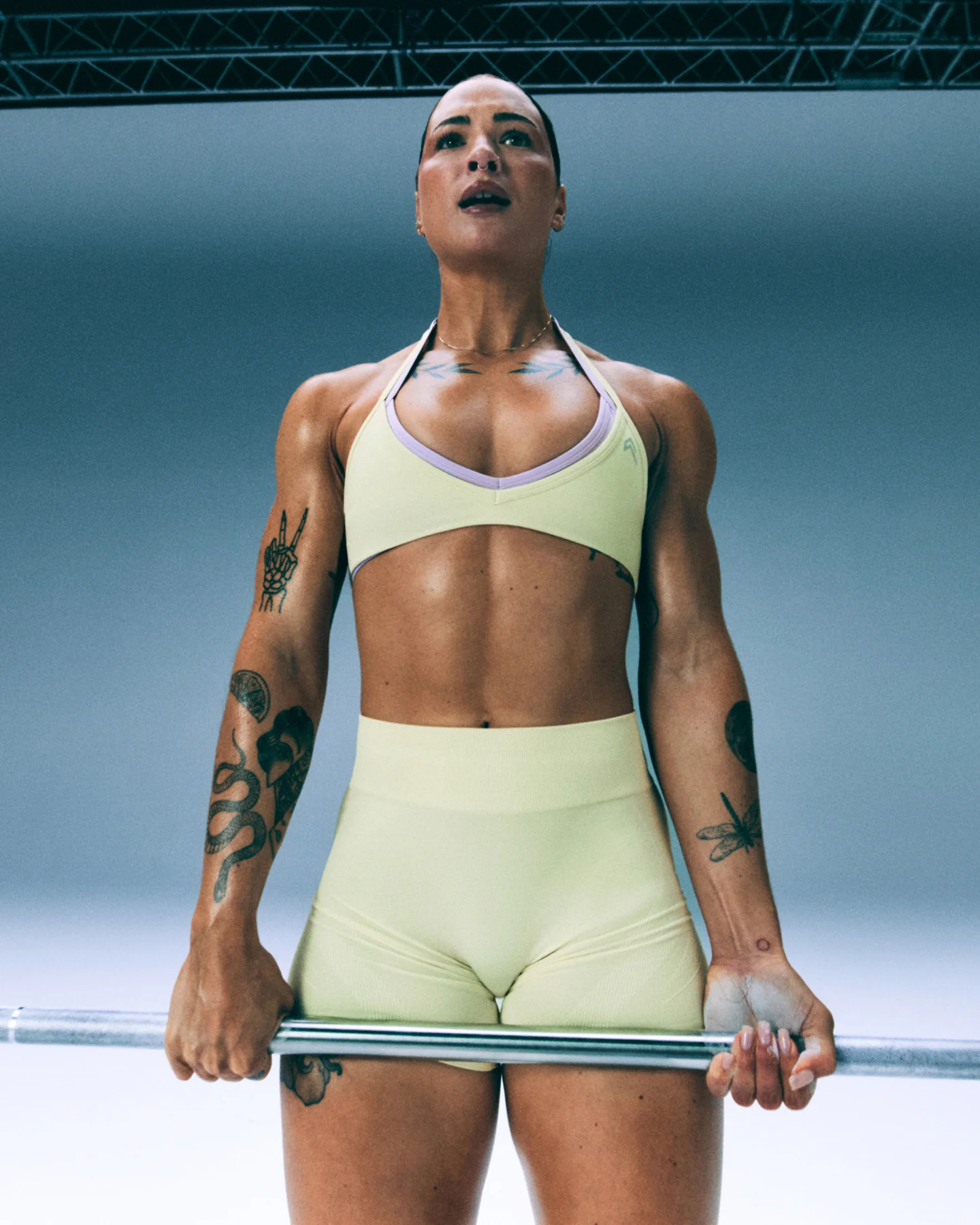 EnhanceLift™ Seamless Minimal Halter Neck Bralette with Grey Logo | Pastel Yellow - Image 2