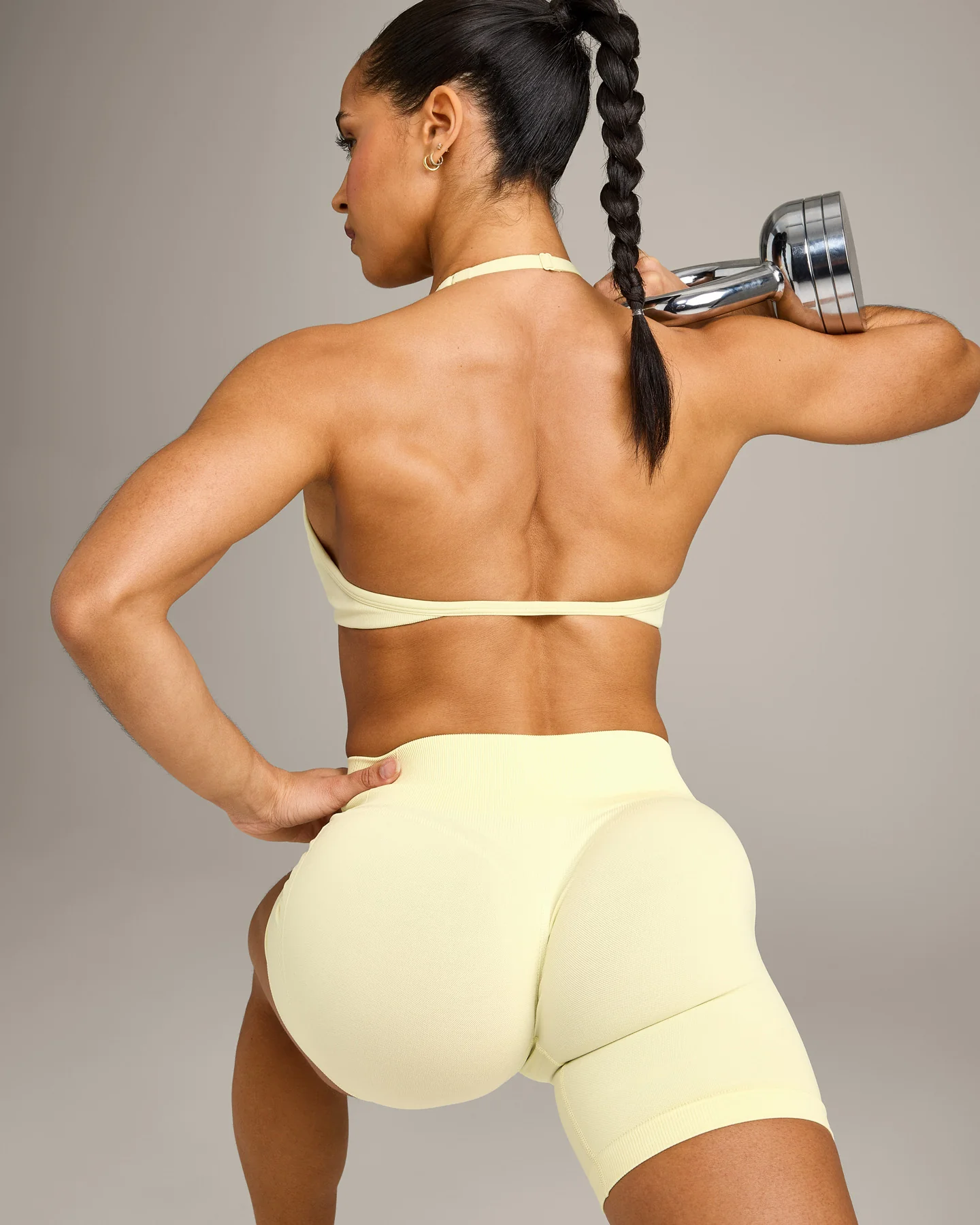EnhanceLift™ Seamless Minimal Halter Neck Bralette with Grey Logo | Pastel Yellow - Image 5