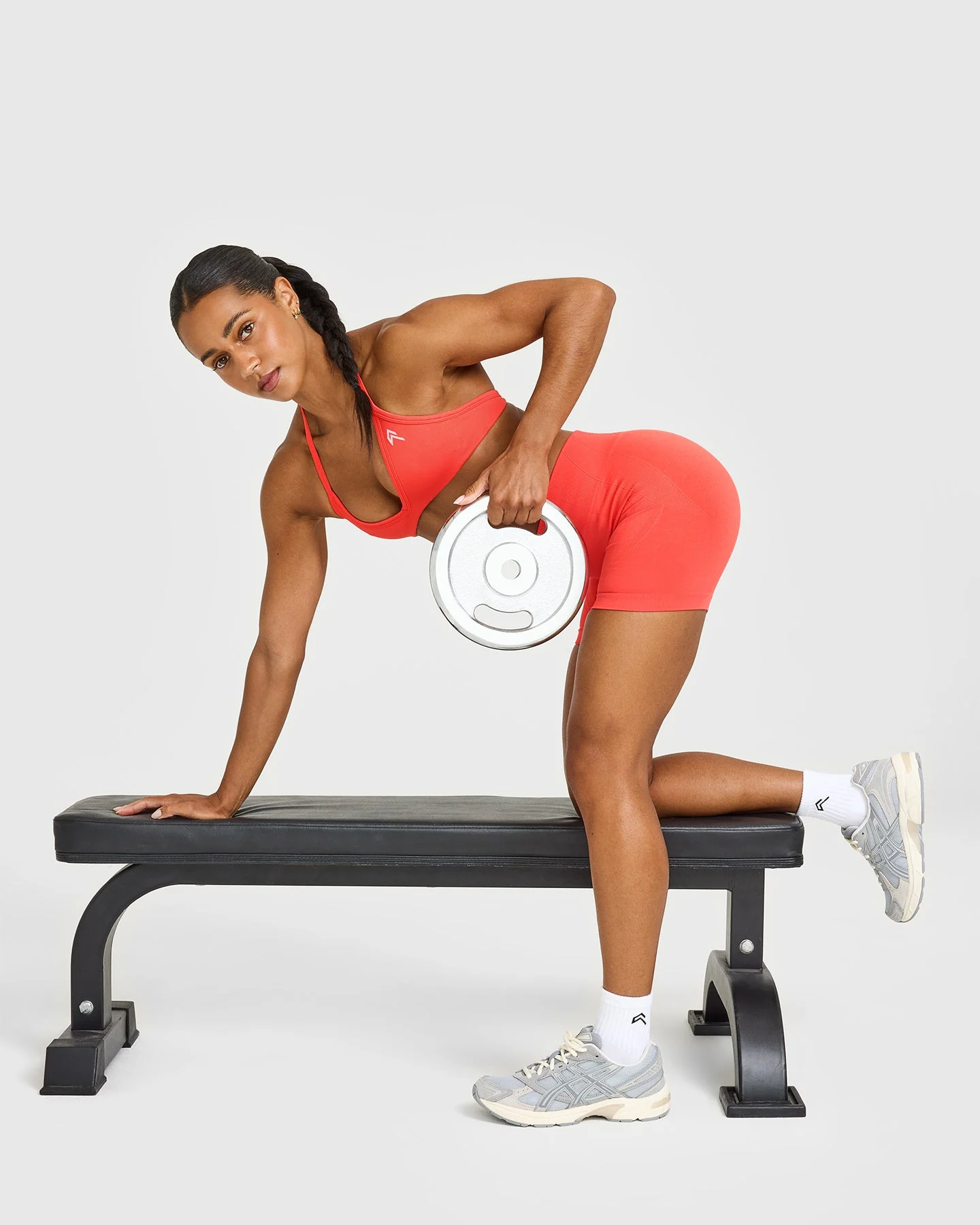 EnhanceLift™ Seamless Minimal Halter Neck Bralette with White Logo | Charged Coral - Image 6
