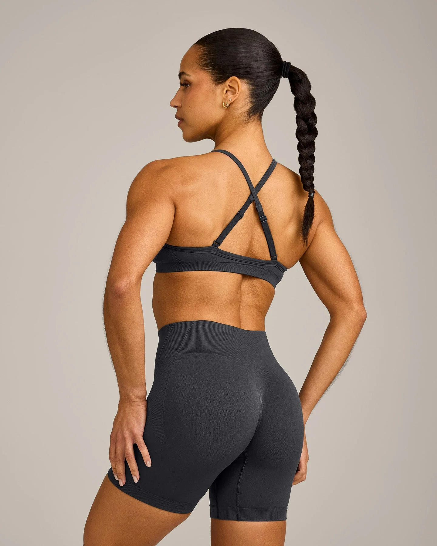 EnhanceLift™ Seamless Strappy Sports Bra with Grey Logo | Coal - Image 2