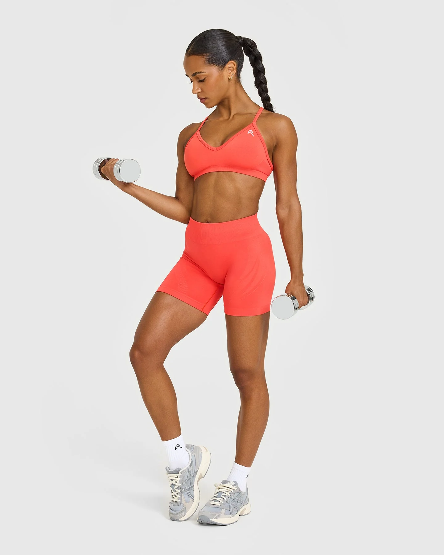 EnhanceLift™ Seamless Strappy Sports Bra with White Logo | Charged Coral - Image 3