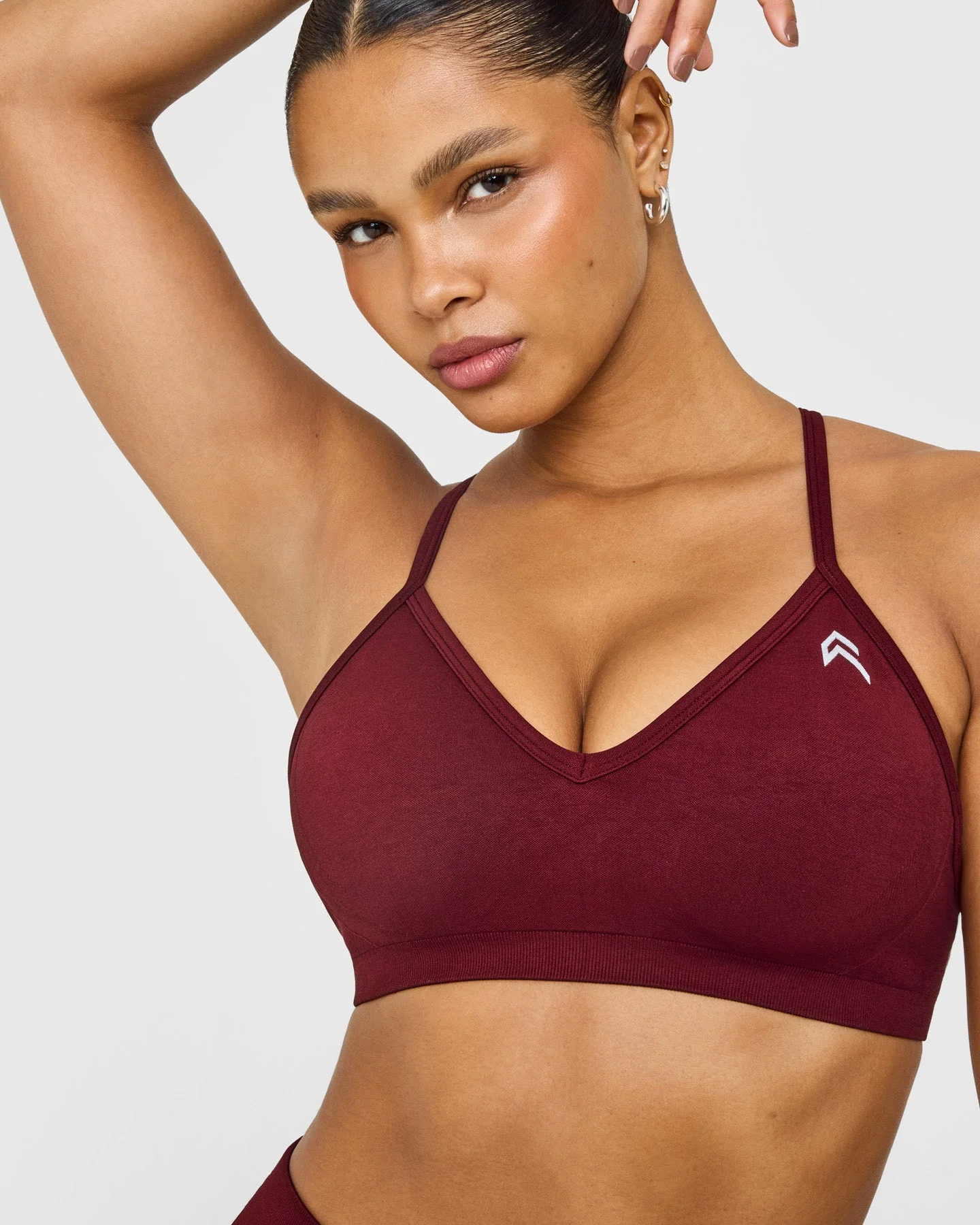EnhanceLift™ Seamless Strappy Sports Bra with White Logo | Rosewood - Image 5