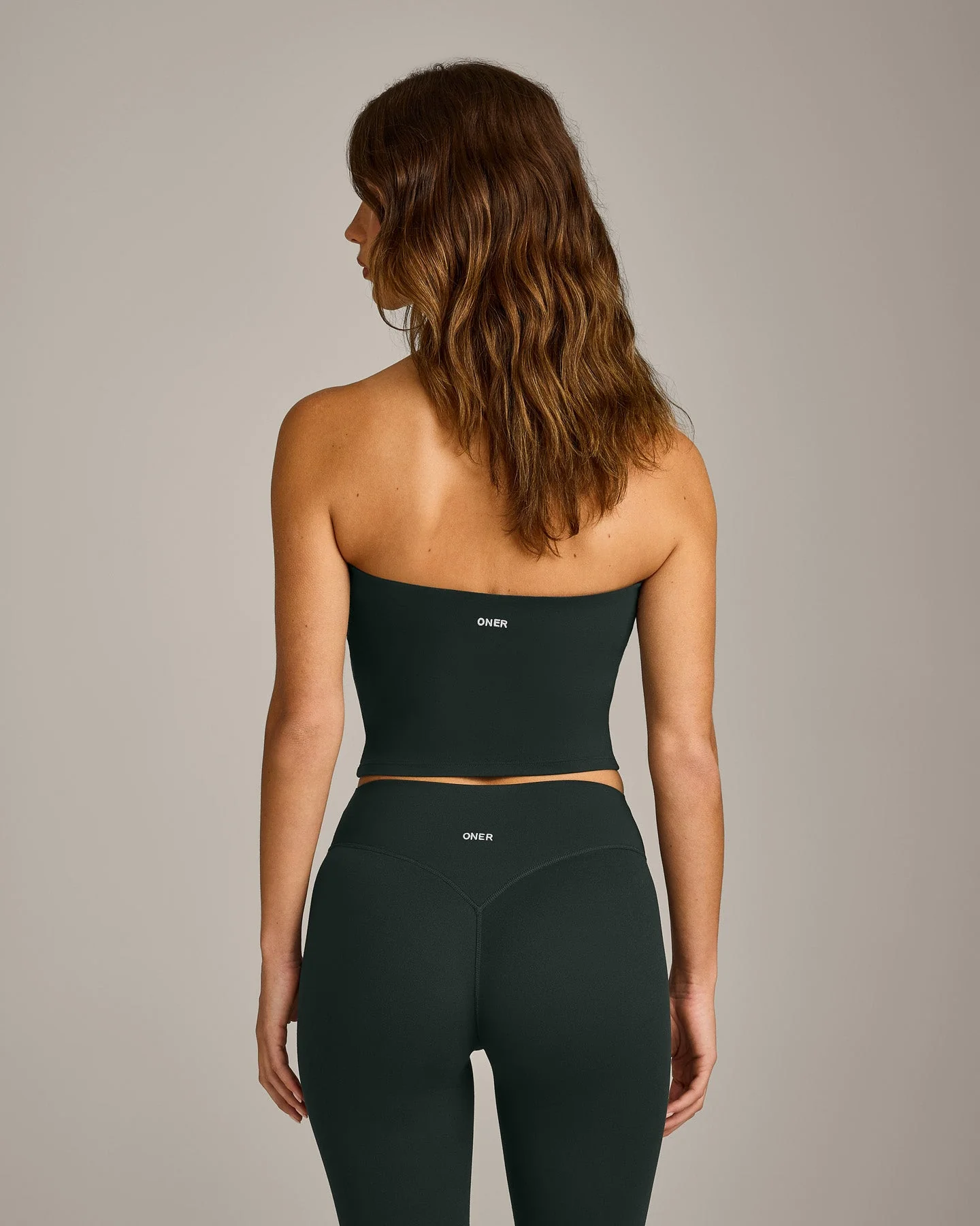 SoftMotion™ Bandeau Mid Vest with Built in Bra Shelf with Grey Logo | Emerald Noir - Image 6