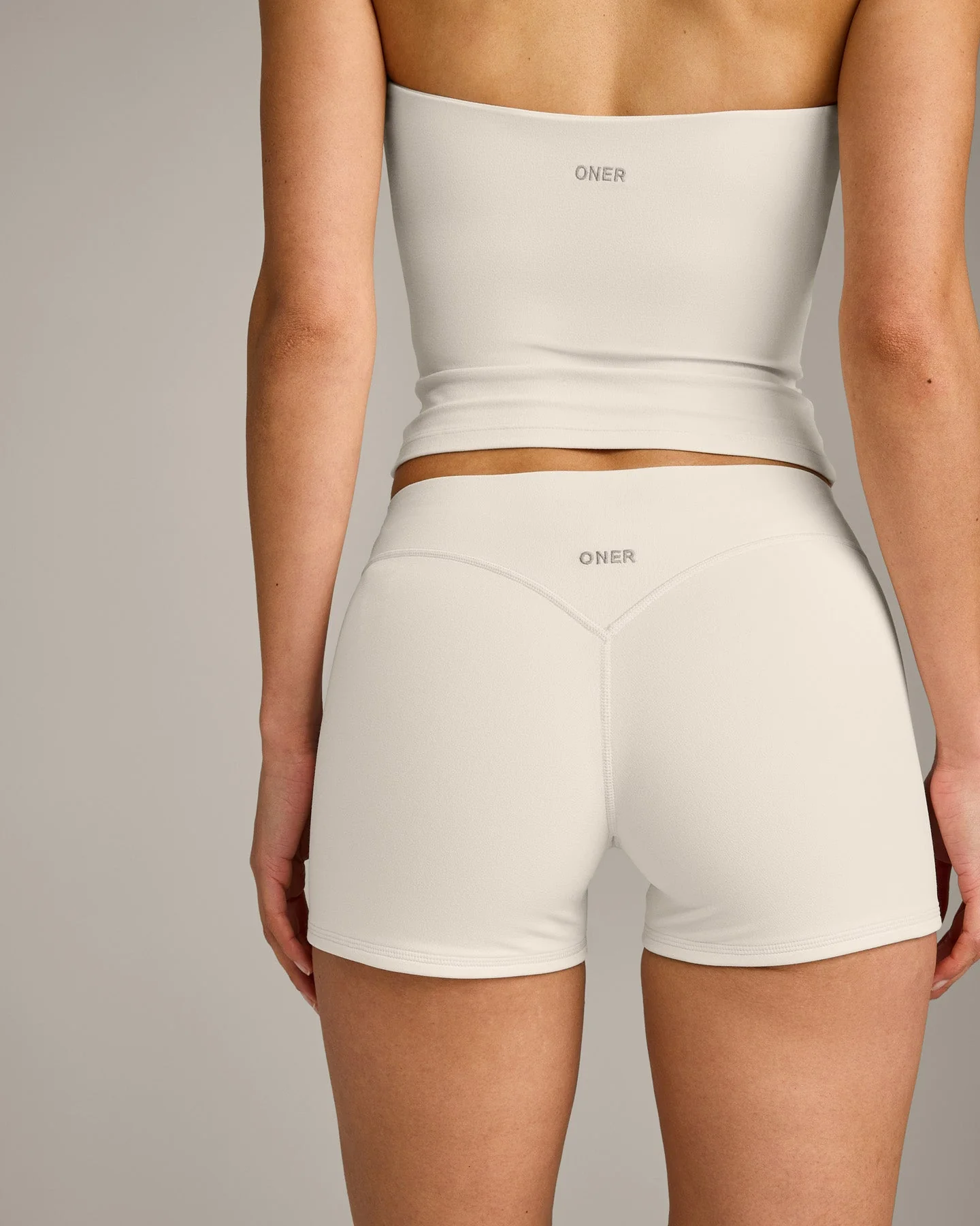 SoftMotion™ Double Layer Mid Rise Shorts 4" with Grey Logo | Marshmallow White - Image 5