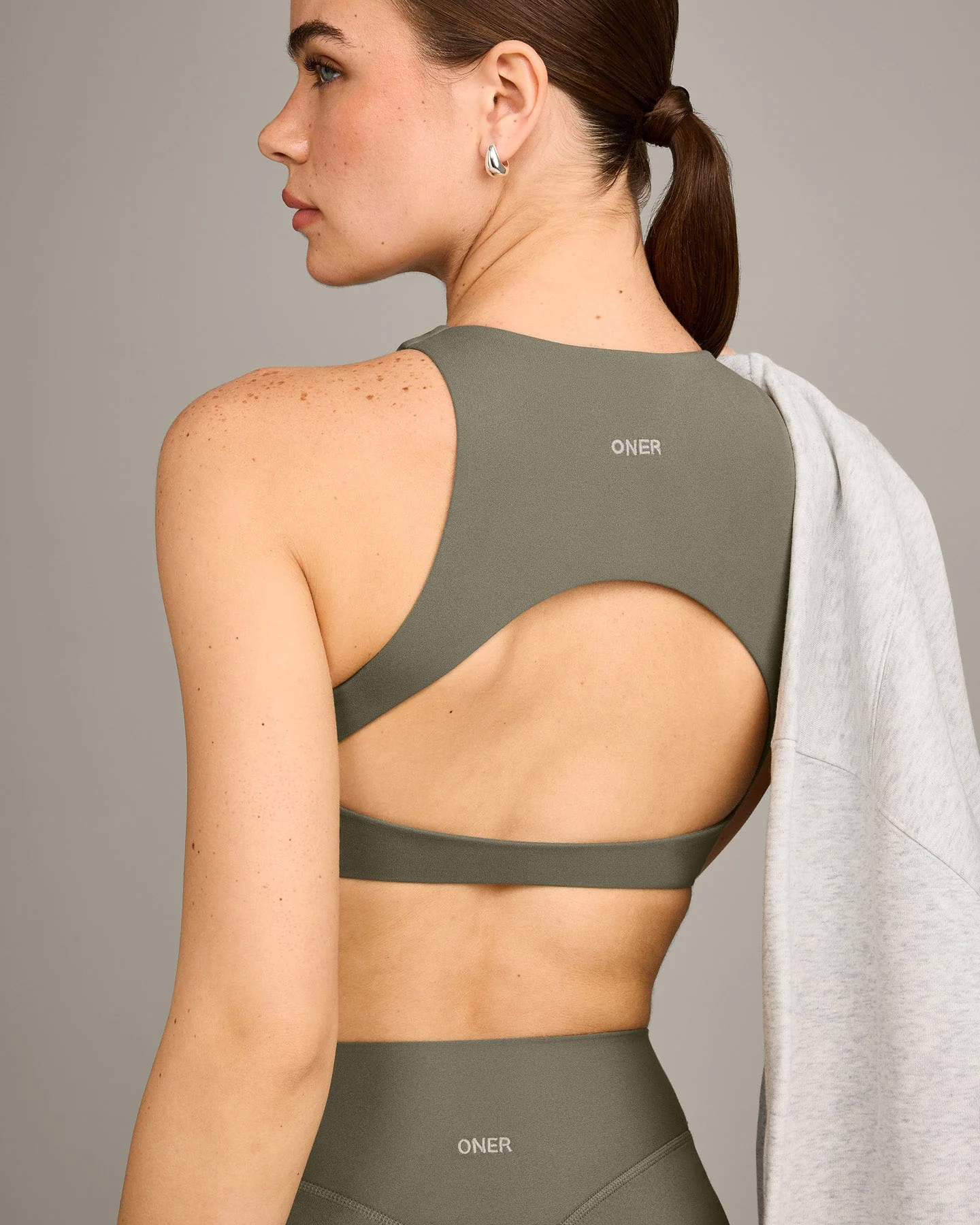 SoftMotion™ High Neck Sports Bra with Grey Logo | Alpine Green - Image 5