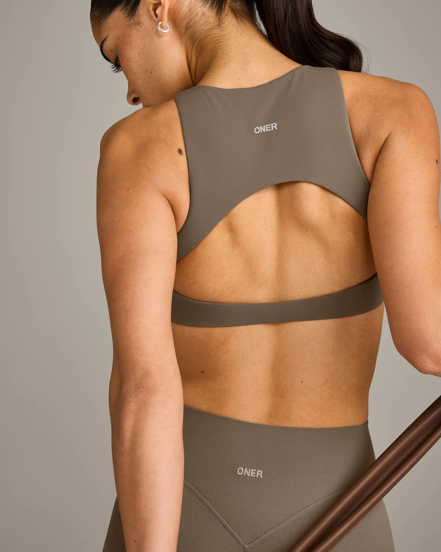 SoftMotion™ High Neck Sports Bra with Grey Logo | Moss Brown - Image 5
