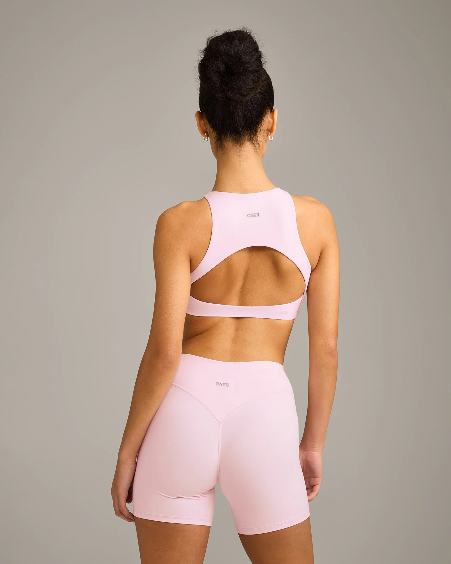 SoftMotion™ High Neck Sports Bra with Grey Logo | Soft Girl Pink - Image 6