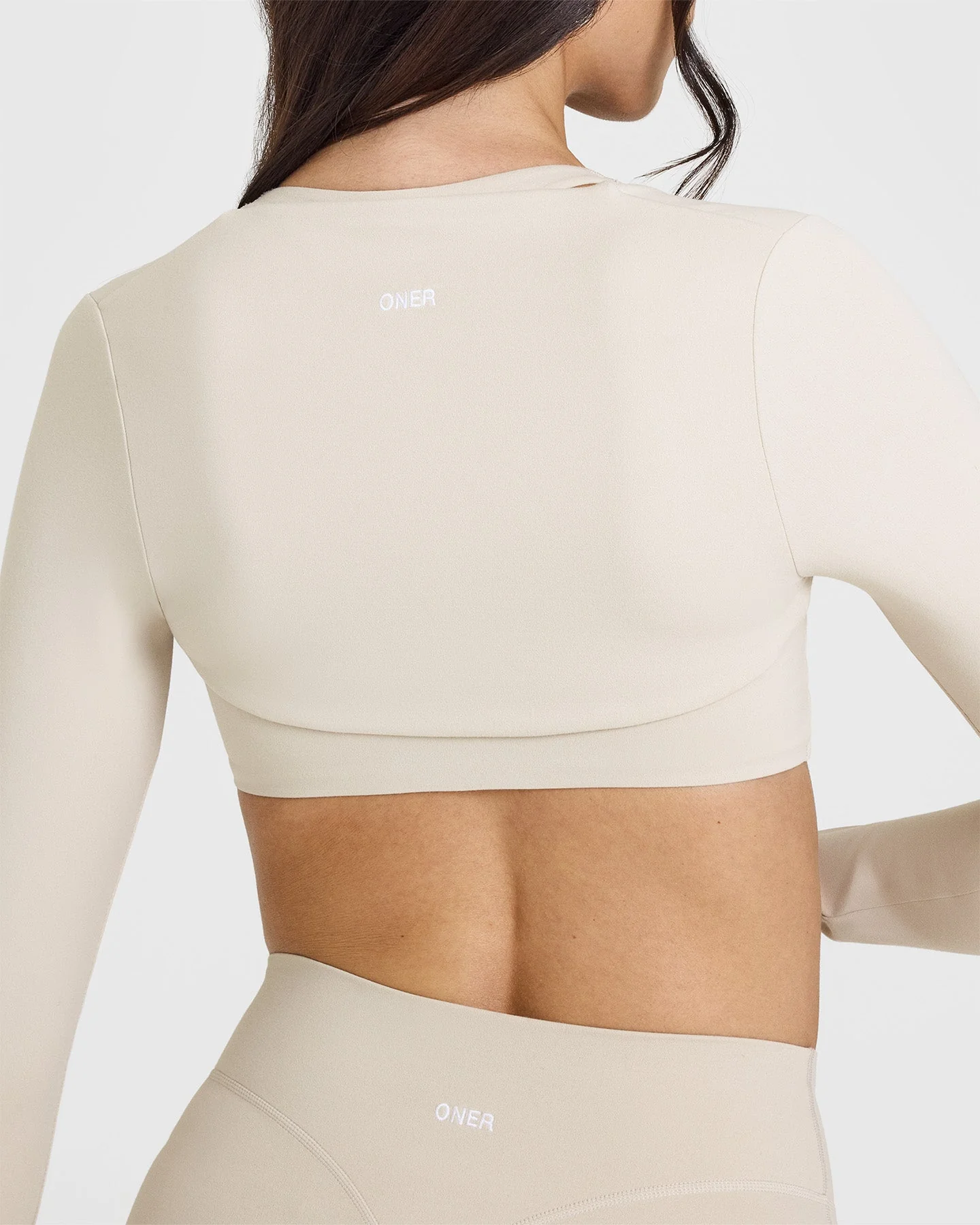 SoftMotion™ Long Sleeve Shrug with White Logo | Sand - Image 5