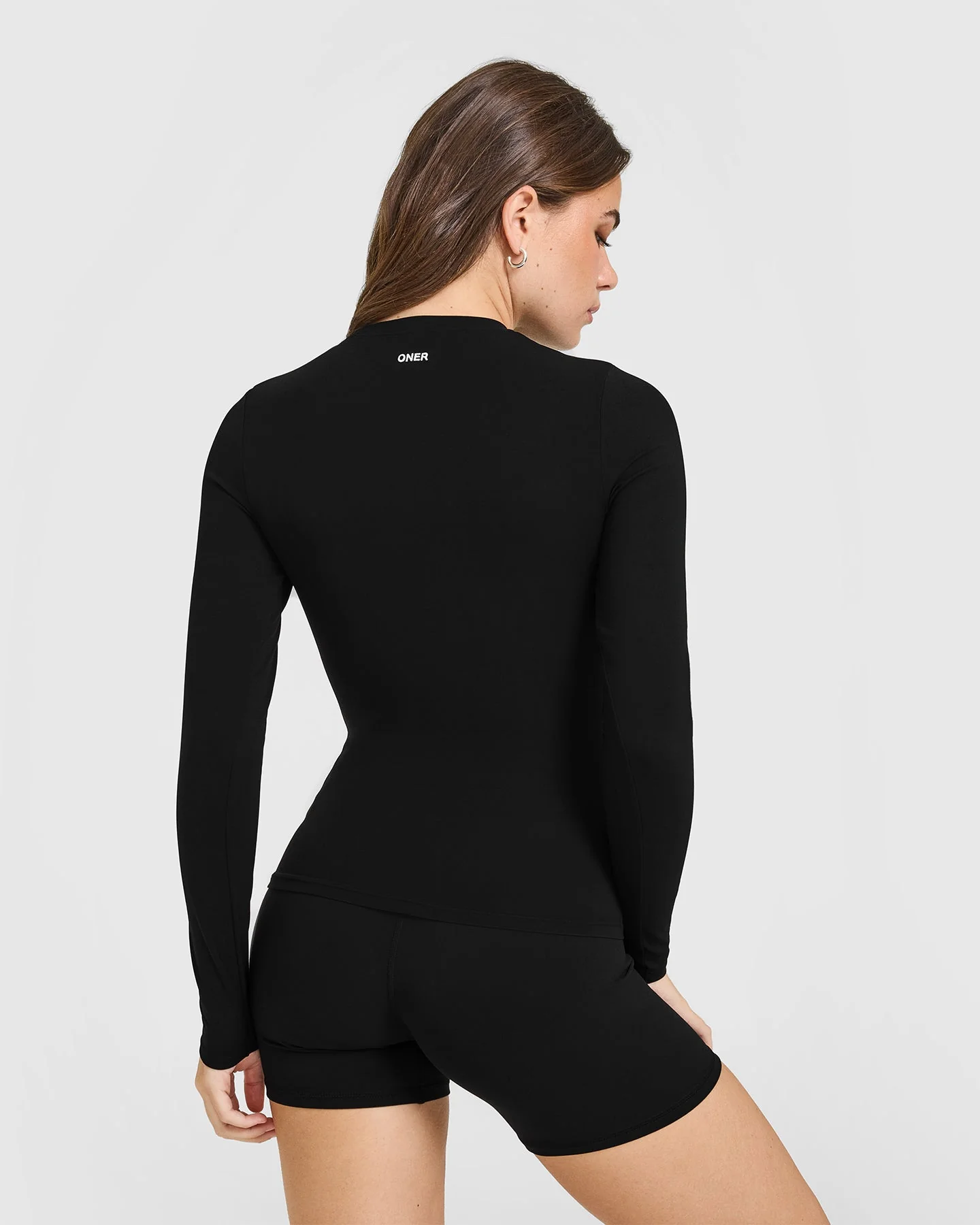 SoftMotion™ Long Sleeve Top with White Logo | Black - Image 2