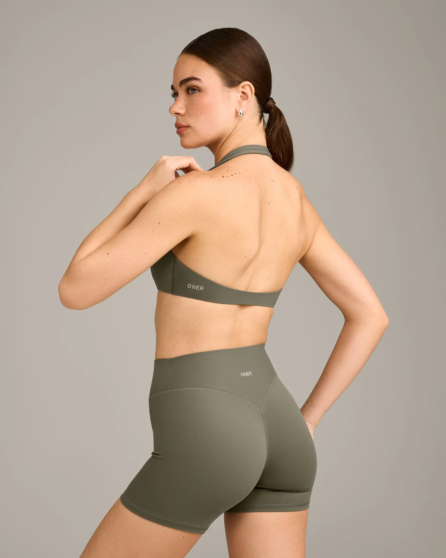 SoftMotion™ Minimal Halter Neck Bralette with Grey Logo | Alpine Green - Image 6