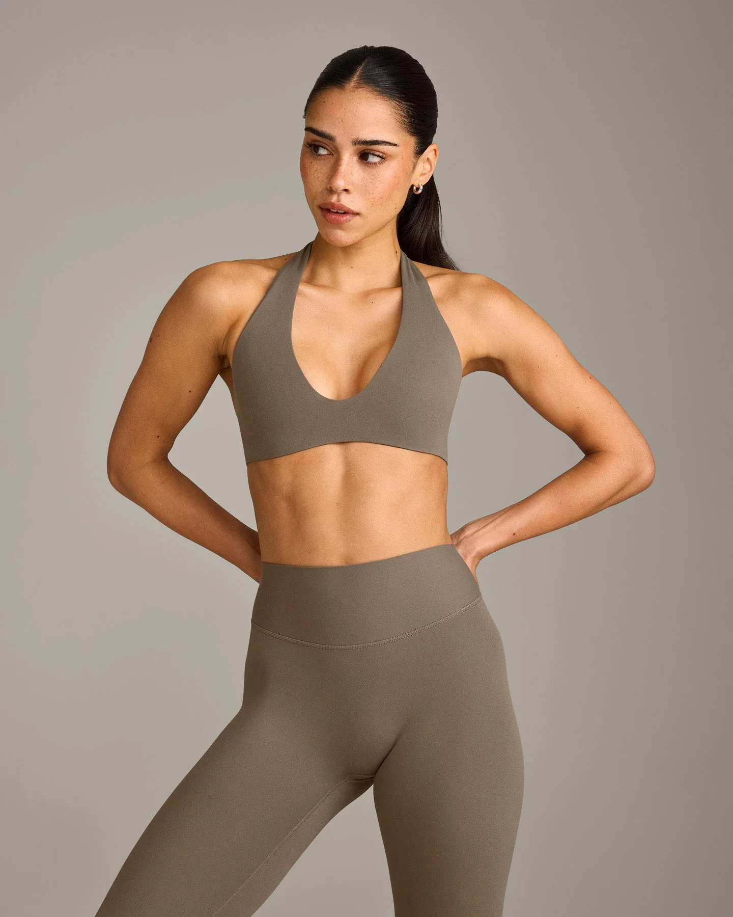 SoftMotion™ Minimal Halter Neck Bralette with Grey Logo | Moss Brown