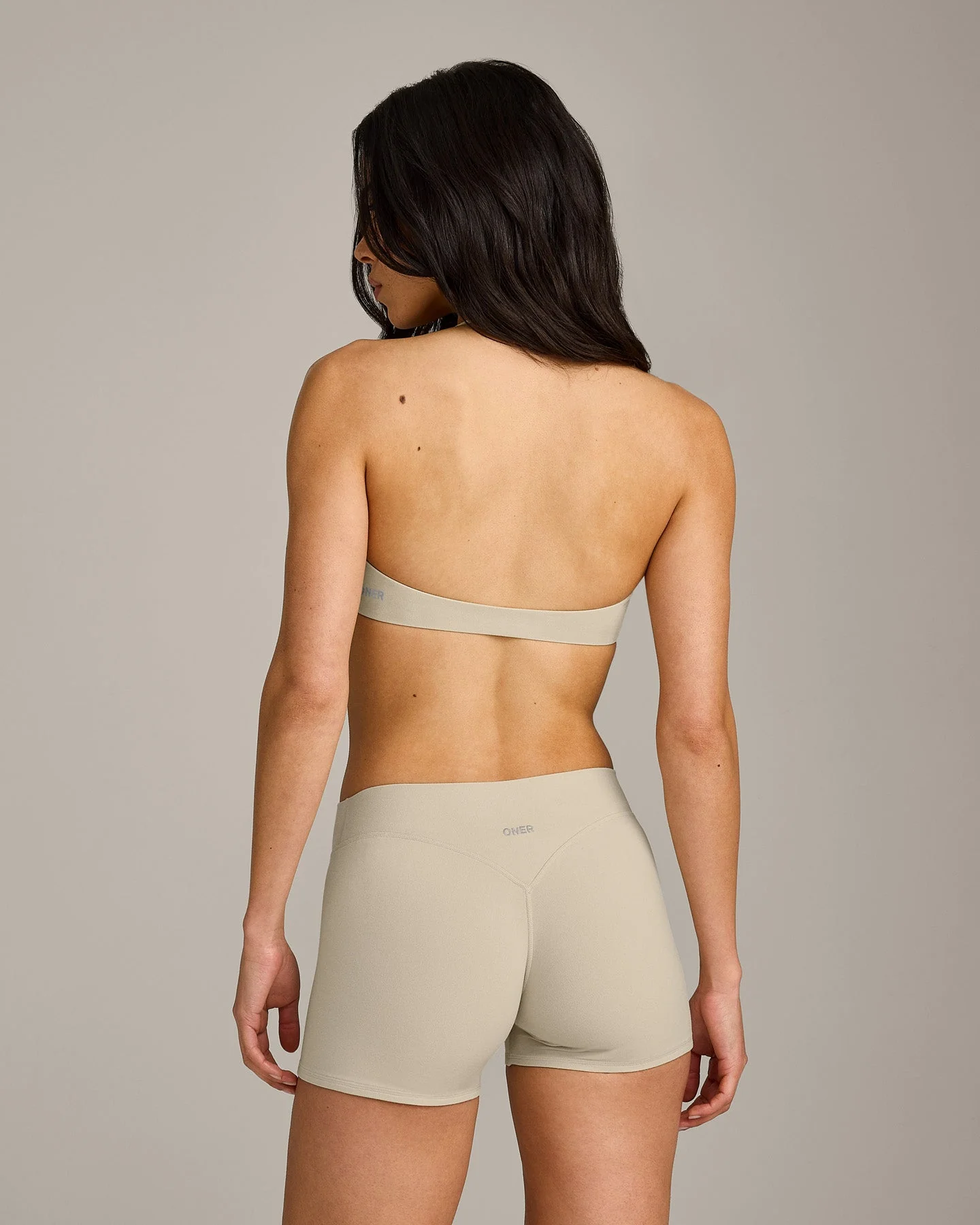 SoftMotion™ Minimal Halter Neck Bralette with Grey Logo | Oatmeal - Image 6