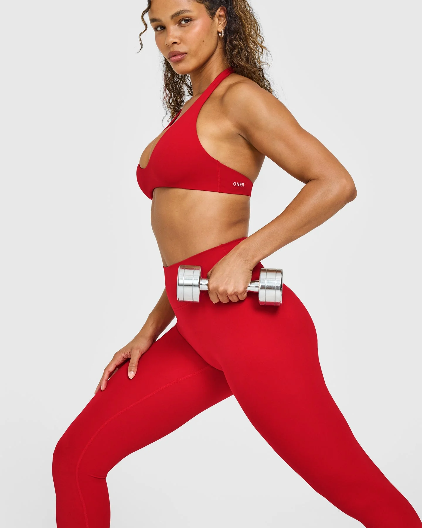 SoftMotion™ Minimal Halter Neck Bralette with White Logo | Light Toasted Red - Image 6