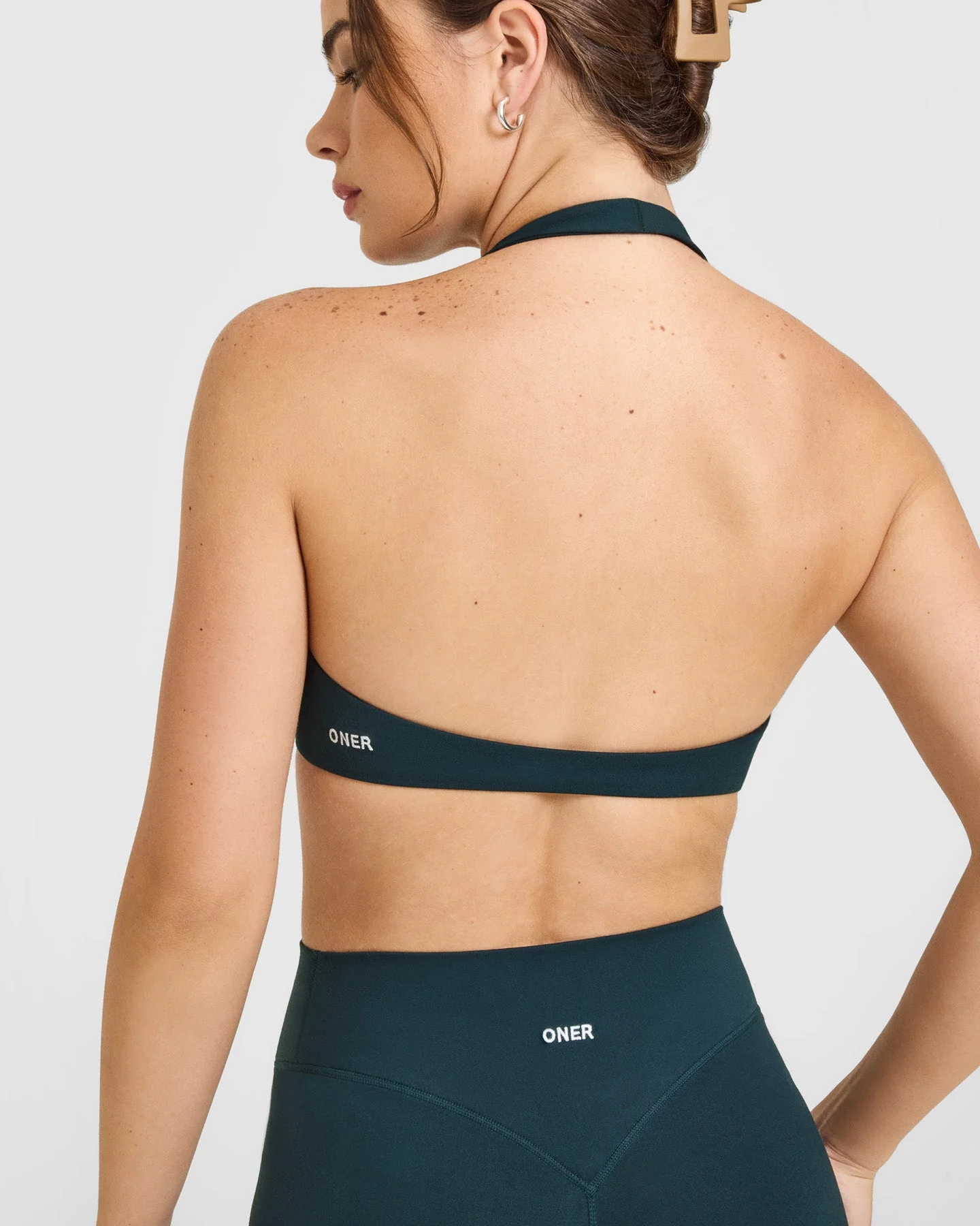 SoftMotion™ Minimal Halter Neck Bralette with White Logo | Oil Blue - Image 4