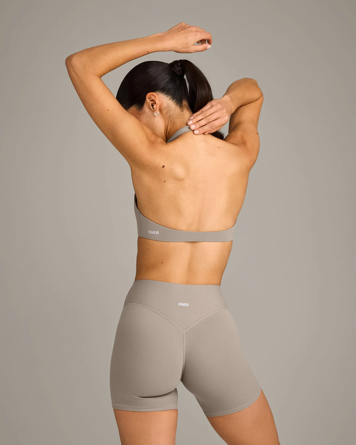 SoftMotion™ Minimal Halter Neck Bralette with White Logo | Warm Sand - Image 5