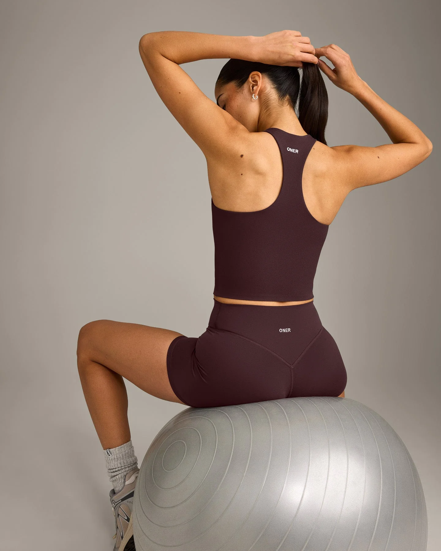 SoftMotion™ Racer Back Mid Vest with Built in Bra Shelf with Grey Logo | Plum Brown - Image 2