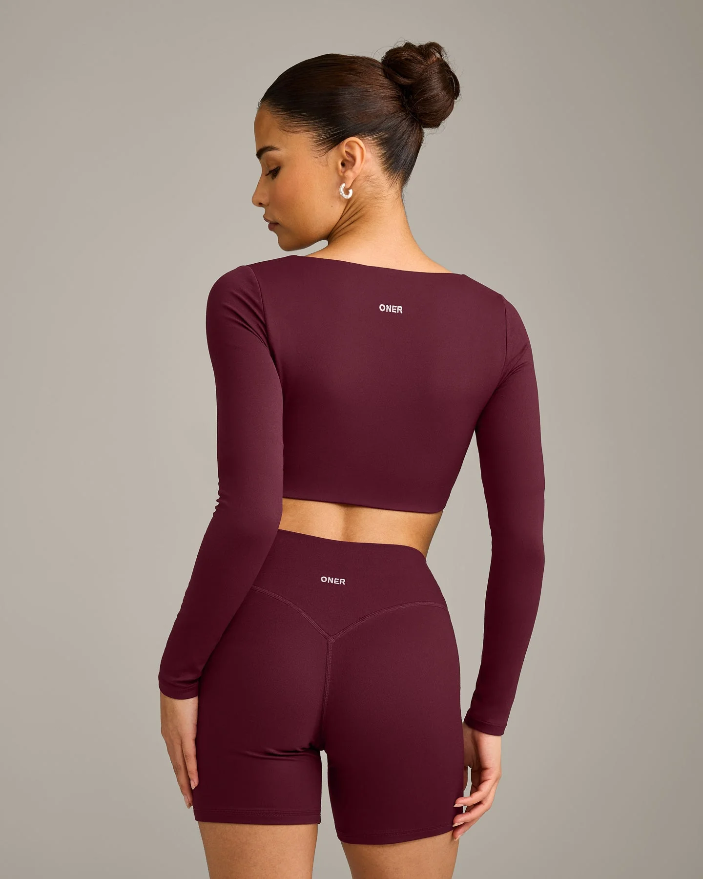 SoftMotion™ Scoop Neck Long Sleeve Crop Top with Built in Bra Shelf with Grey Logo | Cherry Lacquer Purple - Image 6