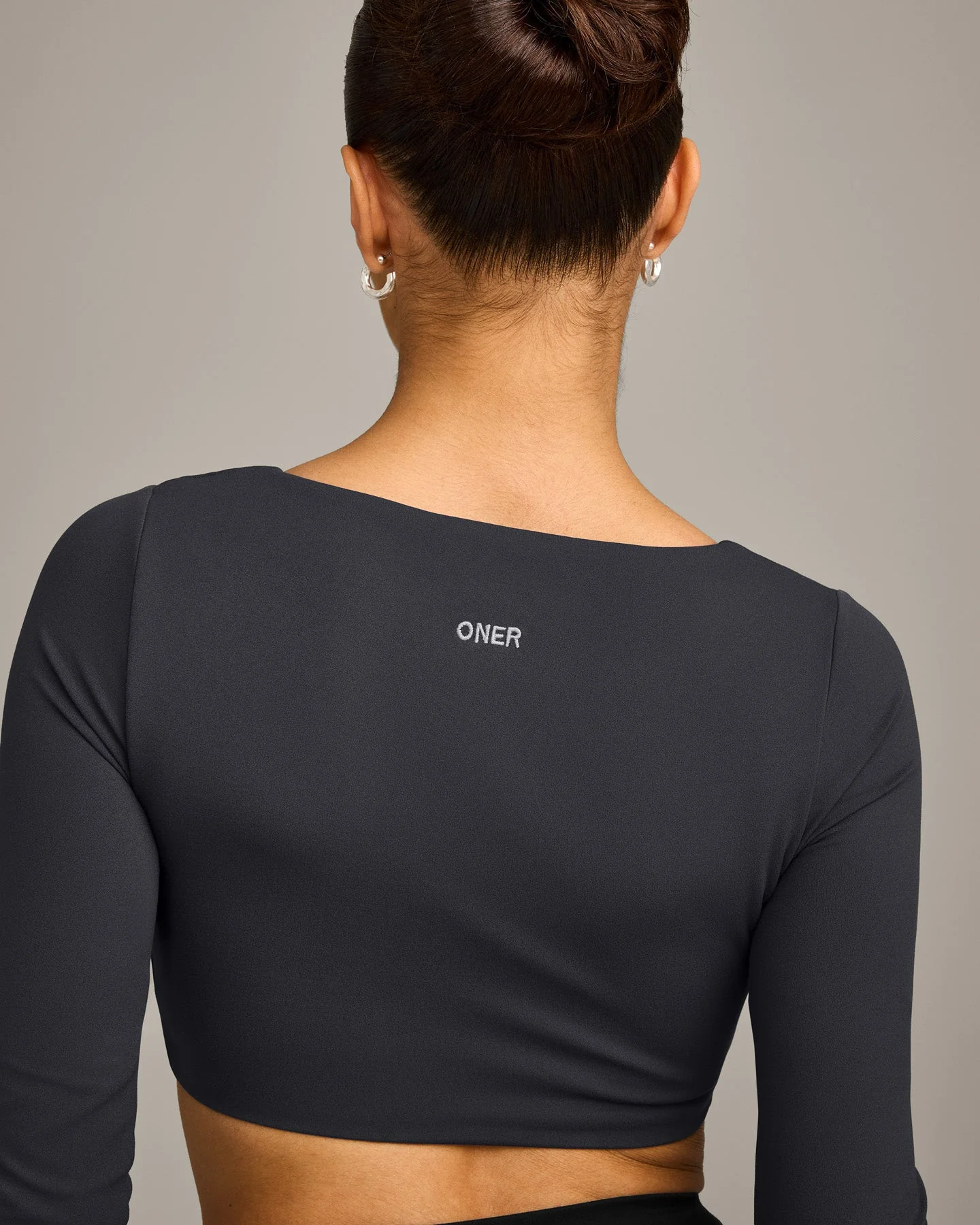 SoftMotion™ Scoop Neck Long Sleeve Crop Top with Built in Bra Shelf with Grey Logo | Coal - Image 4