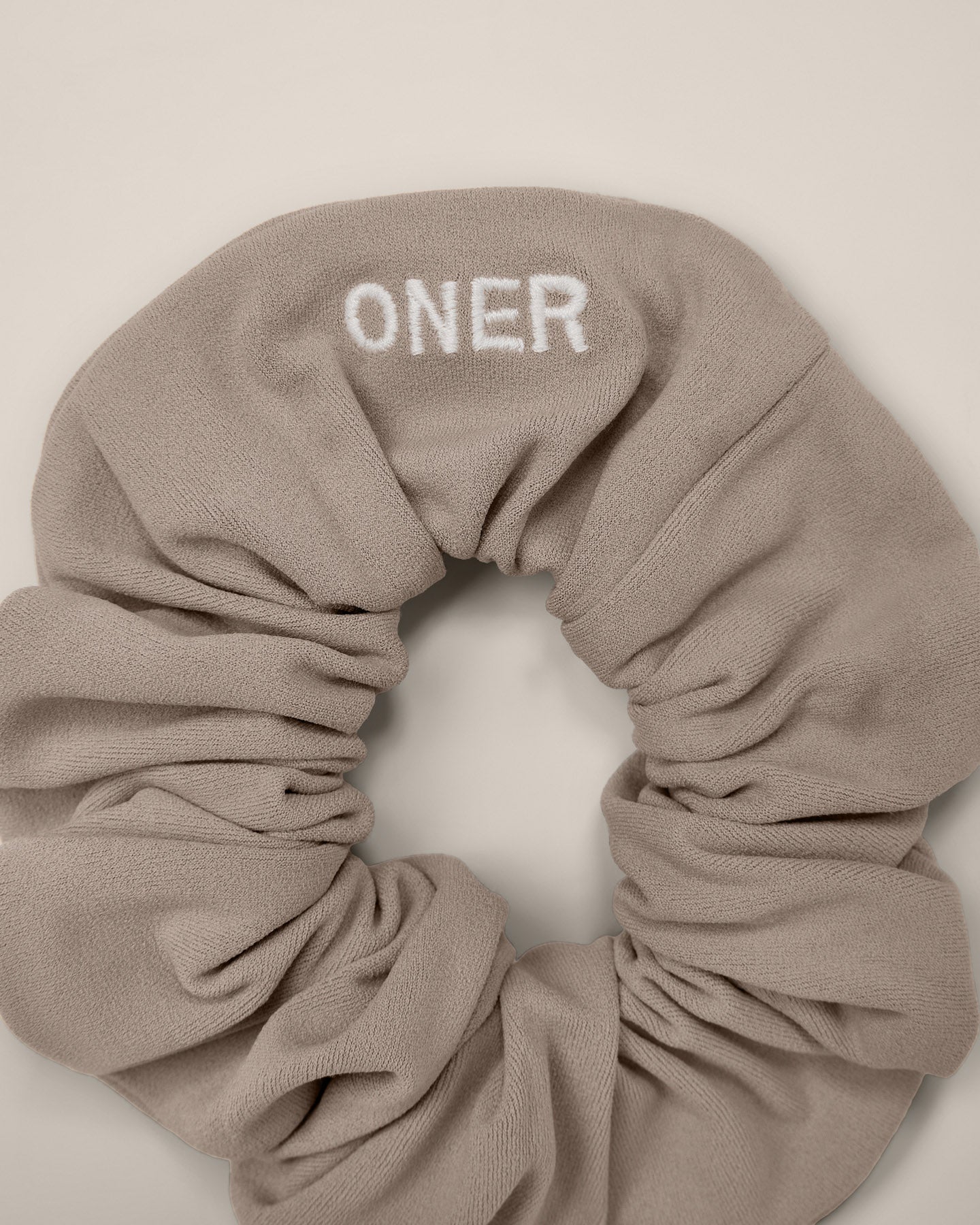SoftMotion™ Scrunchie with White Logo | Warm Sand - Image 5