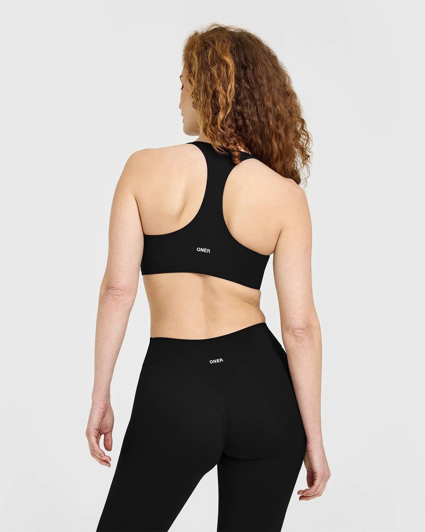SoftMotion™ Sports Bra with White Logo | Black - Image 4