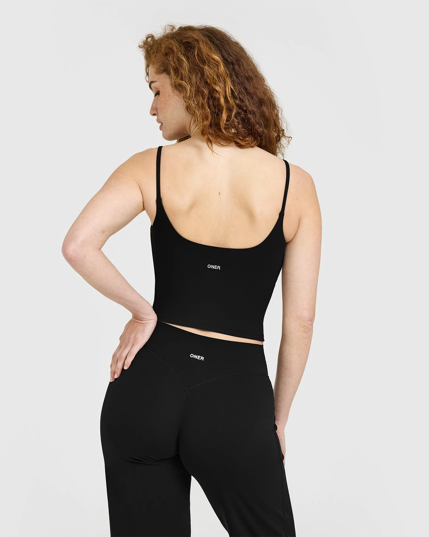 SoftMotion™ Strappy Mid Vest with Built in Bra Shelf with White Logo | Black - Image 2