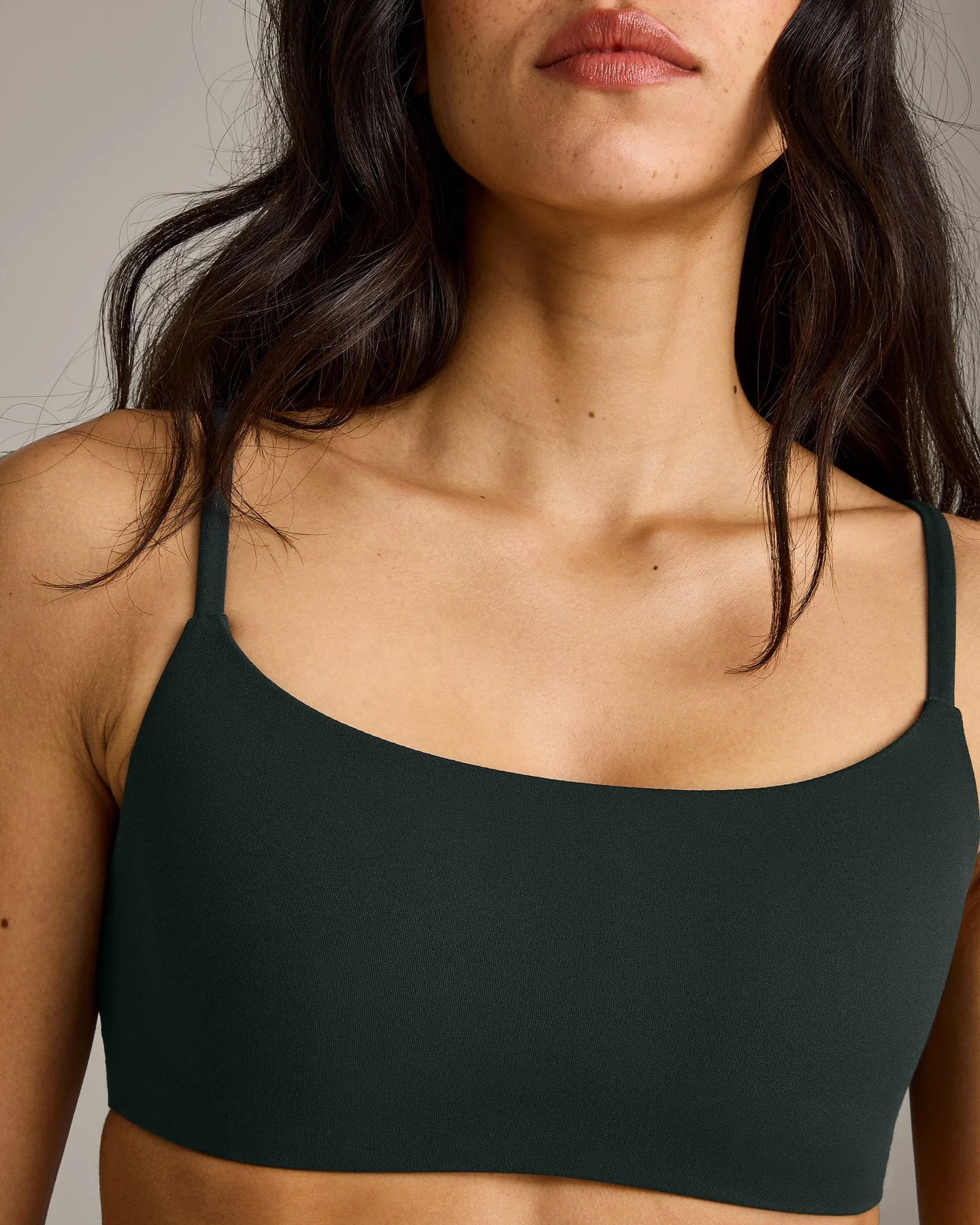 SoftMotion™ Strappy Sports Bra with Grey Logo | Emerald Noir - Image 5