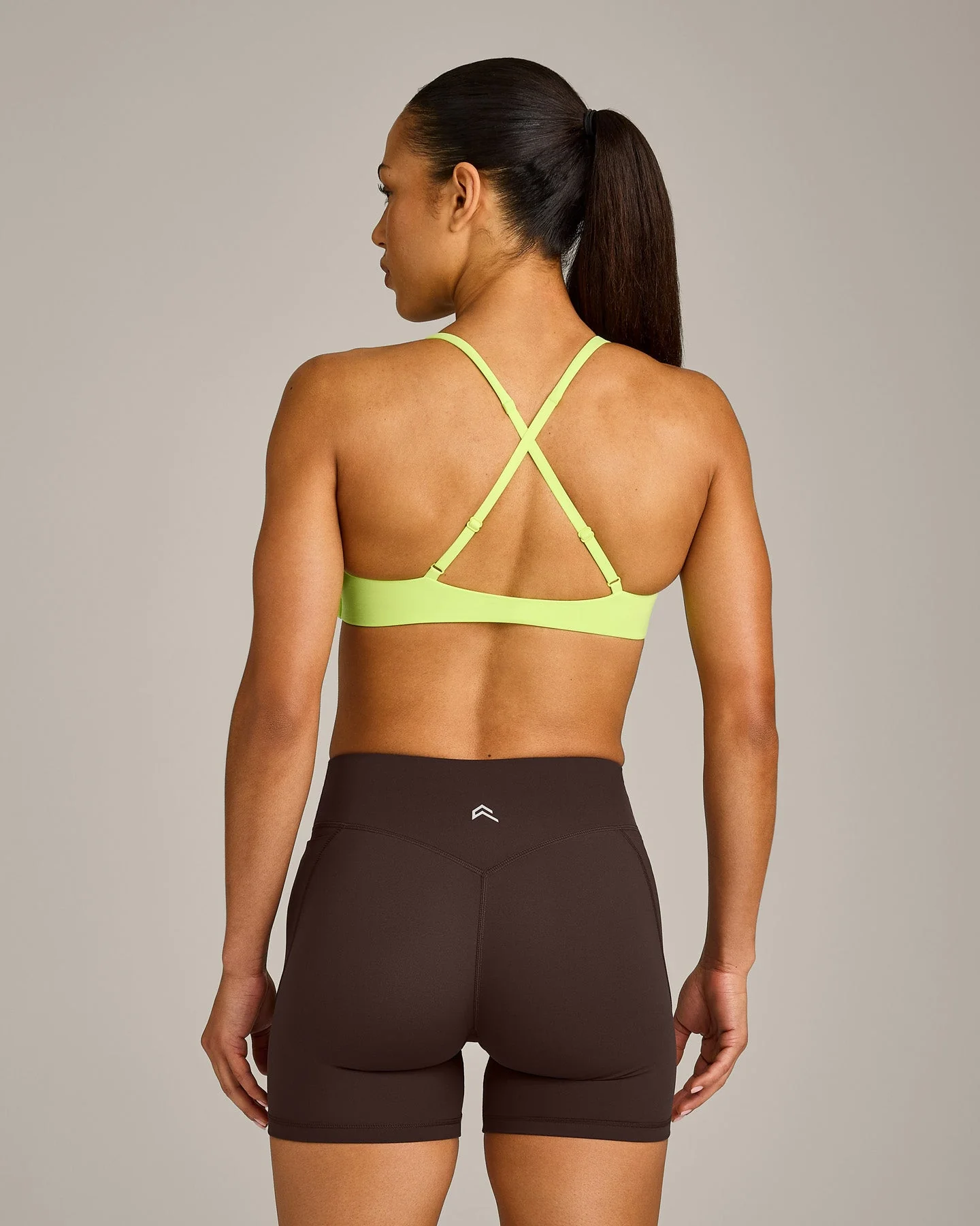 UnifiedMove™ Cross Back Sports Bra with Reflective Logo | Citrus Green - Image 2